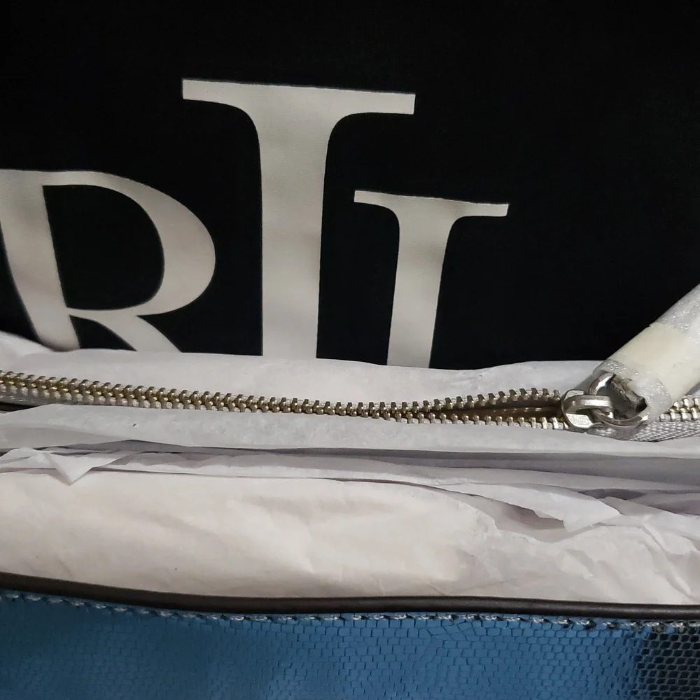 Lauren Ralph LaurenSilver Satchel with Structured Shape and Flap Closure.‎ (B1)